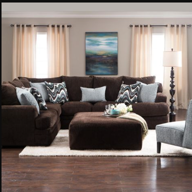 Descubre cómo darle vida a tu sala con un sofá marrón
